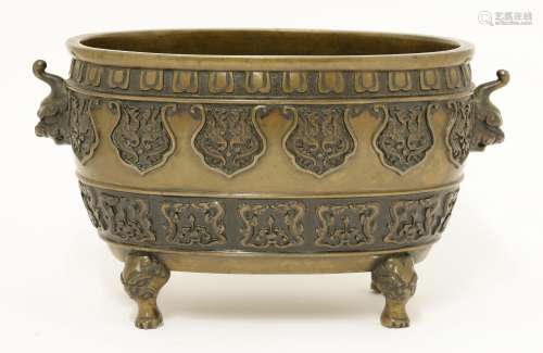 A Japanese bronze censer,  Meiji period (1868-1912), of oval shape, moulded with shaped panels of ...