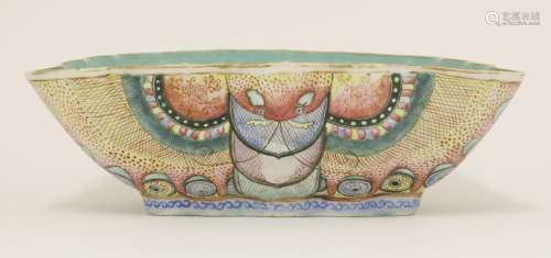 A Chinese famille rose bowl, 19th century, of lobed trapezoid form, painted with a butterfly around ...