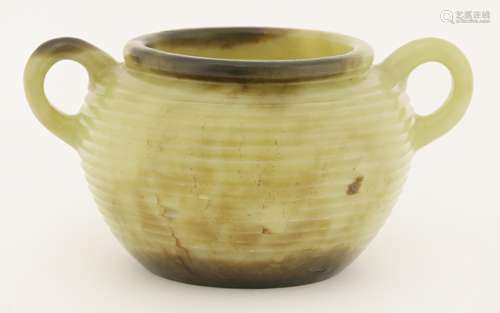 A Chinese hardstone bowl, with reeded decoration to side and two handles, 16.5cm