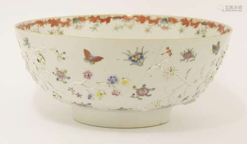 A Chinese export famille rose punch bowl, Qianlong (1736-1795), decorated with applied blossoming ...