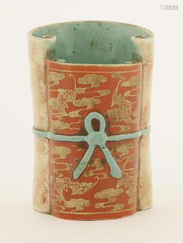 A Chinese faux-marble enamelled porcelain brush pot, Qianlong (1736-1795), in the shape of two ...