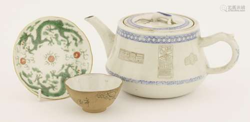 A Chinese blue and white teapot and cover, c.1900, the body with seal patterns between diaper and ...