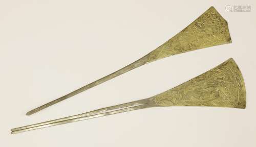 Two Japanese silver gilt hairpins,  probably 18th century, of fan shape, engraved with ho-o amongst ...
