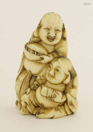 A Japanese ivory netsuke, Meiji period (1868-1912), carved with Hehe Erxian, one seated, the other ...