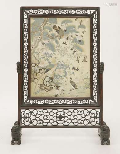 A Chinese table screen, early 20th century, with an embroidery of a pheasant standing on a rock ...