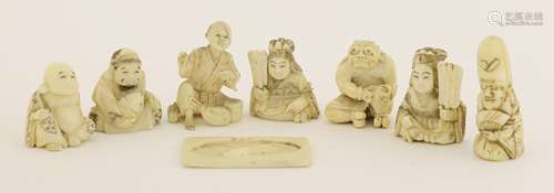 A collection of Japanese ivory carvings, Meiji period (1868-1912), comprising Ebisu, Jurojin, Hotei ...