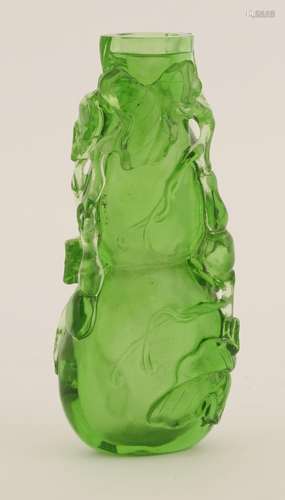 A Peking glass snuff bottle, 19th century, the bright emerald green bottle in the shape of a double ...