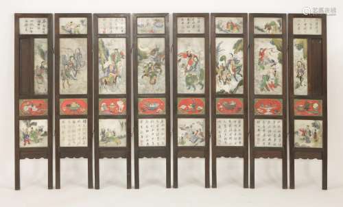 A Chinese eight-fold screen, early 20th century, with hardstone insert panels, possibly jade, one ...
