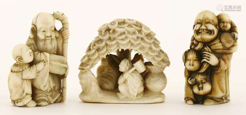 Three Japanese ivory netsuke, Meiji period (1868-1912), one of triangular form, with travellers ...