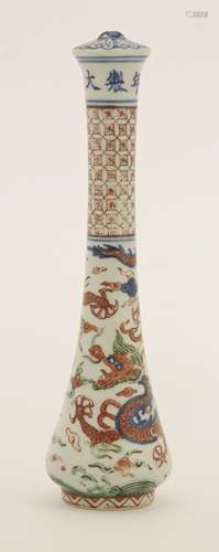 A Chinese wucai brush handle, painted with a dragon chasing a flaming pearl amongst clouds above ...