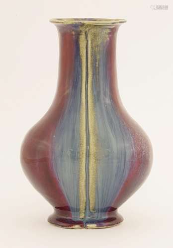 A Chinese jun-style flambé vase, 18th century, of trefoil form, with the glaze running down the ...