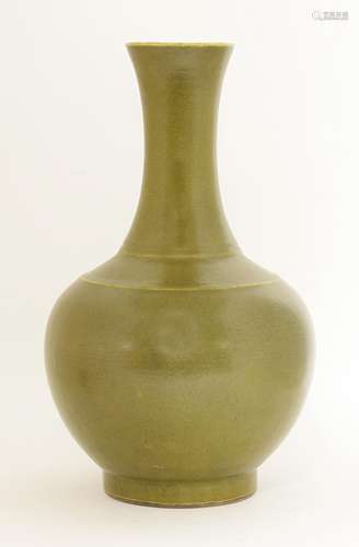 A Chinese vase, late Qing dynasty, of globular form with flared mouth covered with tea dust glaze, ...