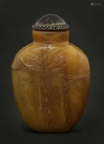 A Chinese jade snuff bottle, 20th century, carved with a deer looking up to a bird in a pine tree, ...