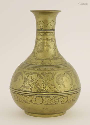 A Korean brass vase, of circular body with flared mouth, with yin-yang symbols between scrolling ...