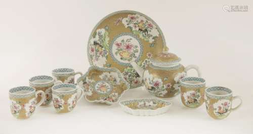 A collection of famille rose teawares, Yongzheng (1723-1735), comprising: a teapot, cover and tray, ...