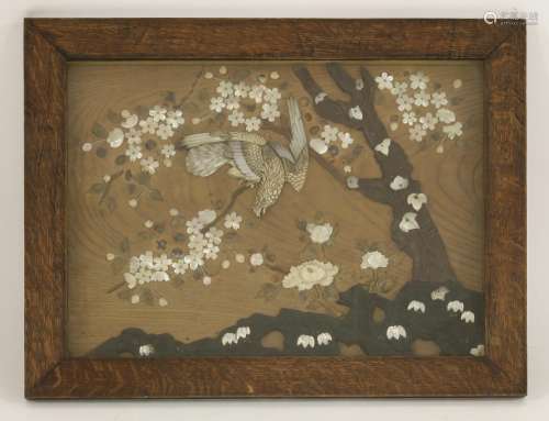 A Shibayama wood panel, Meiji (1868-1912), onlaid with ivory, mother-of-pearl and wood, of an eagle ...