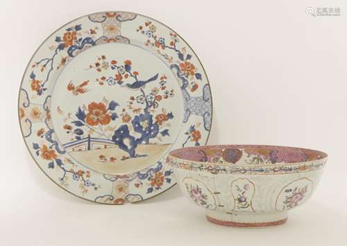 A Chinese Imari charger, early 18th century, painted with a magpie standing on a prunus branch next ...