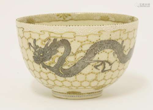 A Japanese Tokyo 'Satsuma' bowl, Meiji period (1868-1912), with a silver dragon against a fishnet ...
