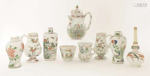 A collection of Chinese famille verte, Kangxi (1662-1722), enamelled with flowers, birds, sea ...