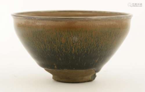 A Chinese jian ware tea bowl, Song dynasty or later, the glaze in the style of hare's fur and with ...