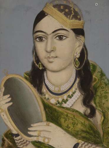 An Indian portrait painting, early 19th century, of a lady in elaborate jewellery and wearing a ...