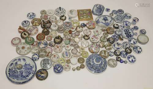 A collection of ceramic lids, 18th century and later, including blue and white, Canton and famille ...