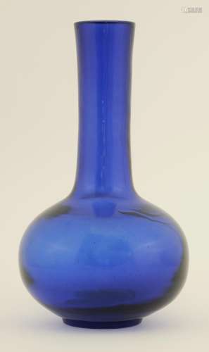 A Chinese monochrome Peking glass vase, the blue globular body with elongated neck, four character ...