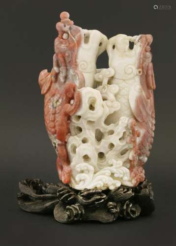 A Chinese agate double vase, 20th century,  of a pair of carp transforming into dragons by rocks, ...