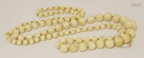 An ivory graduated bead necklace, from 0.5 to 2cm, 56cm diameter