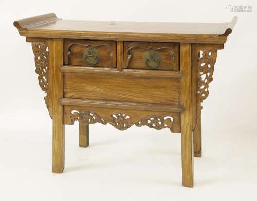 A Chinese elm coffer table, early 20th century, with everted flanges and shaped spandrels, pierced ...