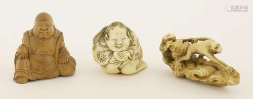 A collection of three Japanese netsuke, Meiji period (1868-1912), one carved in ivory of an ape ...