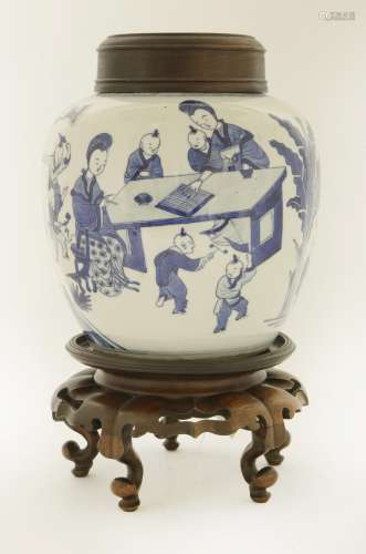 A Chinese blue and white jar, late Qing dynasty, painted with ladies playing with boys in a garden, ...