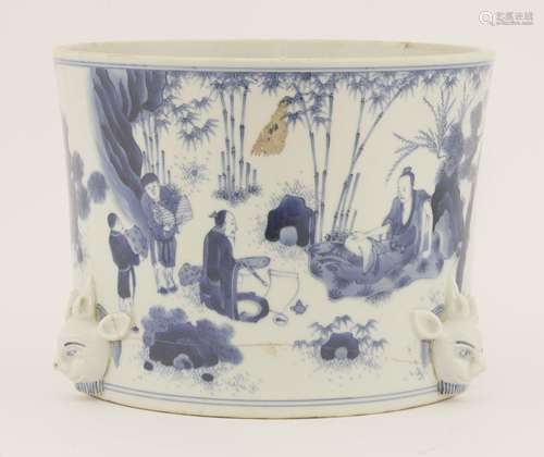 A blue and white brush pot, painted with scholars drinking while playing weiqi, practising ...