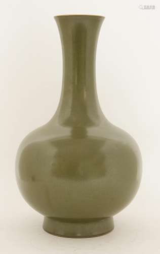 A Chinese tea-glazed vase, modern, the globular body with long neck and flared mouth, on a circular ...