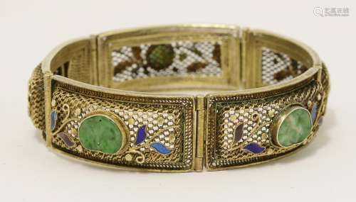 A Chinese silver gilt hinged bracelet, 1930s, the mesh ground enamelled with leafy scrolls inset ...