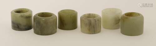 Six Chinese jade archers' rings, of regular form, various sizes (6)