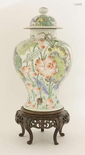 A Chinese famille verte vase and cover, 20th century, of baluster shape, painted with birds amongst ...