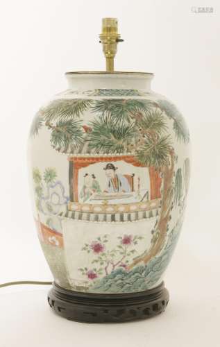 A Chinese famille rose vase,  possibly 18th century, painted with a young scholar playing qin in ...