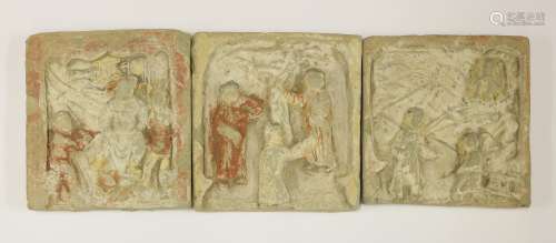 Three Chinese terracotta tiles Yuan dynasty (1279-1368), moulded with figures in a landscape or ...