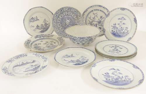 A collection of Chinese blue and white, 18th century, of different shapes, including three plates ...