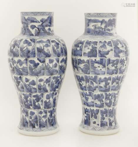 A pair of Chinese porcelain blue and white vases, Kangxi (1662-1722), of baluster form, each ...