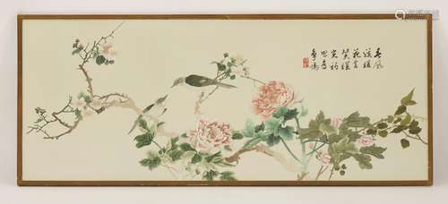 A Chinese embroidery, 20th century, with two birds standing on a peony and a blossoming peach ...