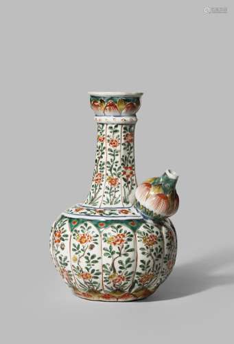 A CHINESE FAMILLE VERTE KENDI KANGXI 1662-1722 With a lobed body and a tall neck decorated with