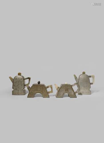 FOUR CHINESE INSCRIBED PEWTER-ENCASED YIXING TEAPOTS AND COVERS QING DYNASTY Three set with jade