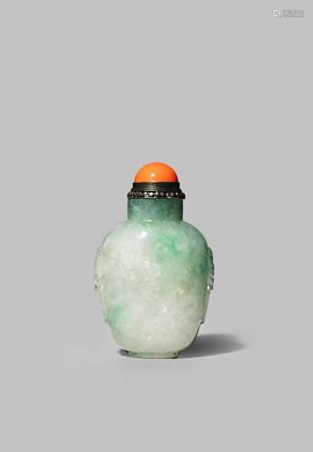 A CHINESE JADEITE SNUFF BOTTLE 19TH CENTURY With a flattened ovoid body with stylised lion-head