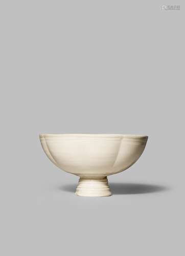 A CHINESE DING STEM BOWL SONG DYNASTY 960-1279 With a gently lobed body supported on a short