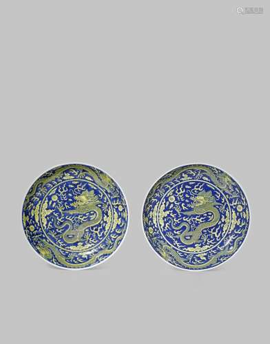 A PAIR OF CHINESE IMPERIAL YELLOW AND BLUE-GROUND 'DRAGON' DISHES SIX CHARACTER QIANLONG SEAL