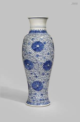 A CHINESE BLUE AND WHITE TALL SLENDER BALUSTER VASE KANGXI 1662-1722 Painted with twelve large aster