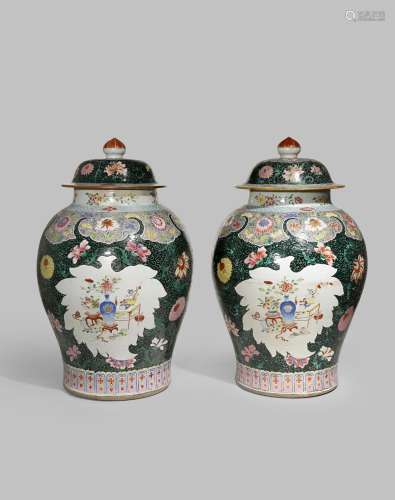 A PAIR OF LARGE CHINESE FAMILLE NOIRE BALUSTER VASES AND COVERS 18TH CENTURY Each painted with