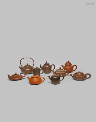 NINE CHINESE YIXING TEAPOTS AND COVERS QING DYNASTY AND LATER Rounded, square-section, lobed and